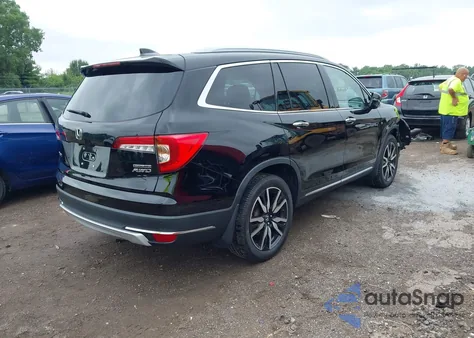 2019 Honda Pilot Touring z USA, uszkodzony, nr VIN 5FNYF6H93KB013191